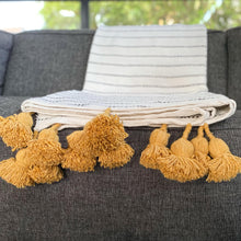 Load image into Gallery viewer, Pompom blanket white with yellow pompoms
